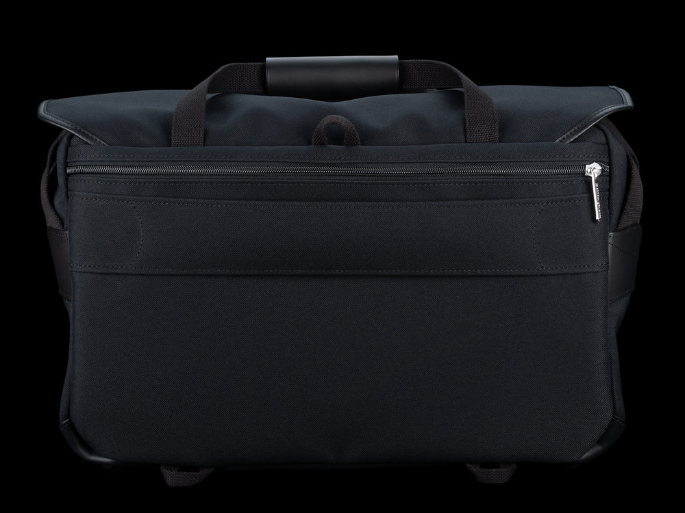 Billingham 555 MKII Camera & Laptop Bag - Black FibreNyte / Black Leather - Rear View with luggage strap.