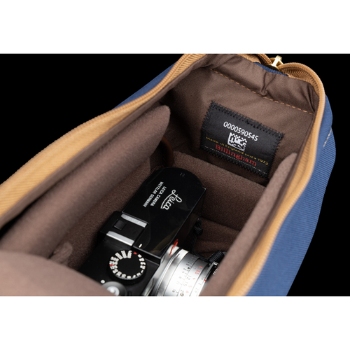 Camera inside Capsule 1 Navy FibreNyte Chocolate Leather